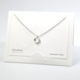 101599, 14K GOLD DIPPED, DAINTY CUTOUT ROUND CUBIC ZIRCONIA CHARM NECKLACE