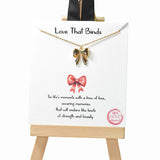 105216, GOLD DIPPED, LOVE THAT BINDS, RIBBON BOW CHARM NECKLACE