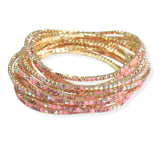 105581, 12 PIECES CRYSTAL RHINESTONE LINE MULTI LAYERED STRETCH BRACELET