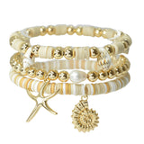 111524, COASTAL STARFISH AND SHELL MULTI LAYERED BEAD STRETCH BRACELET