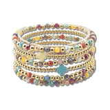 112036, CROSS ACCENT MULTI LAYERED BEADED STRETCH BRACELET