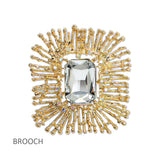 112662, LARGE EMERALD CUT CRYSTAL TEXTURED SUNBURST BROOCH PIN