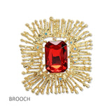 112662, LARGE EMERALD CUT CRYSTAL TEXTURED SUNBURST BROOCH PIN