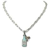 112685, WESTERN WHISKEY BOTTLE AND SADDLE PENDANT NECKLACE