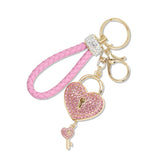 112890, BRAIDED LEATHER PAVE HEART LOCK KEY KEYCHAIN AND BAG CHARM