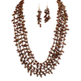 112958, MULTI STRAND WOVEN ELONGATED CHIP BEAD STATEMENT NECKLACE
