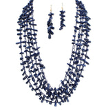 112958, MULTI STRAND WOVEN ELONGATED CHIP BEAD STATEMENT NECKLACE