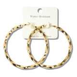 113001, 70MM WATER RESISTANT LARGE TWISTED HOOP EARRINGS