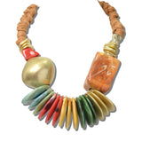 113788, ARTISAN SCULPTED RESIN DISC AND BRAIDED CORD NECKLACE
