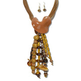 113842, MULTI STRAND CORD AND SCULPTURAL RESIN PEBBLE TASSEL LONG DROP NECKLACE