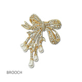 113930, PAVE CRYSTAL BOW & CASCADING PEARL DROP BROOCH PIN