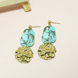 95546, HAMMERED METAL WITH TURQUOISE STONE LOOK CLAY RUBBER EARRING