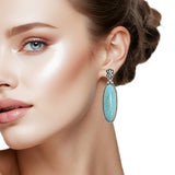 108060, WESTERN OVAL TURQUOISE STONE DANGLE EARRING
