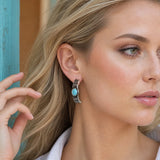 Model wearing Western Turquoise Cabochon Engraved C-Hoop
