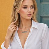 Model wearing Western Bucking Bronco Horizontal Bar Pape